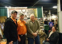 Aarron and Dave with client at sportshow