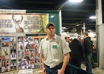 Aaron manning the booth at sportshow